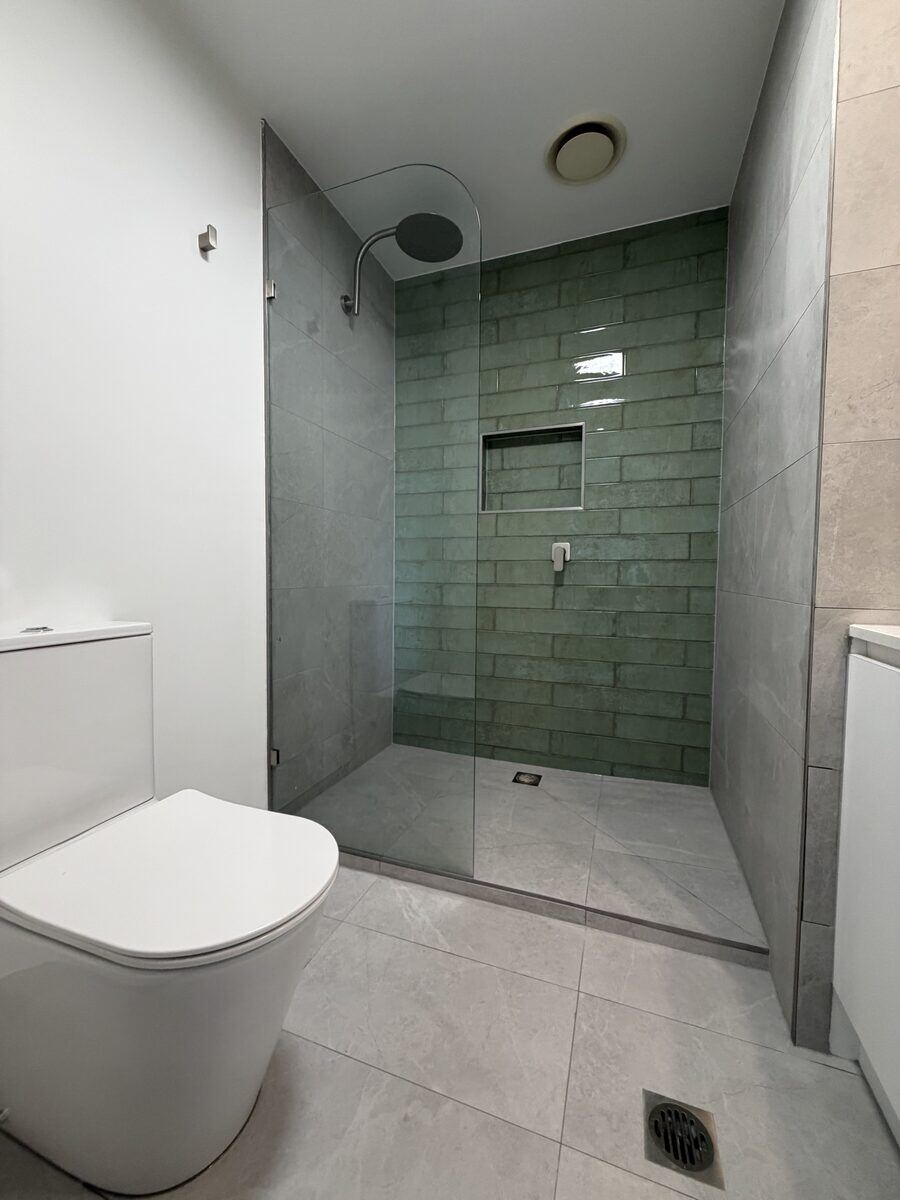 Green tile feature shower